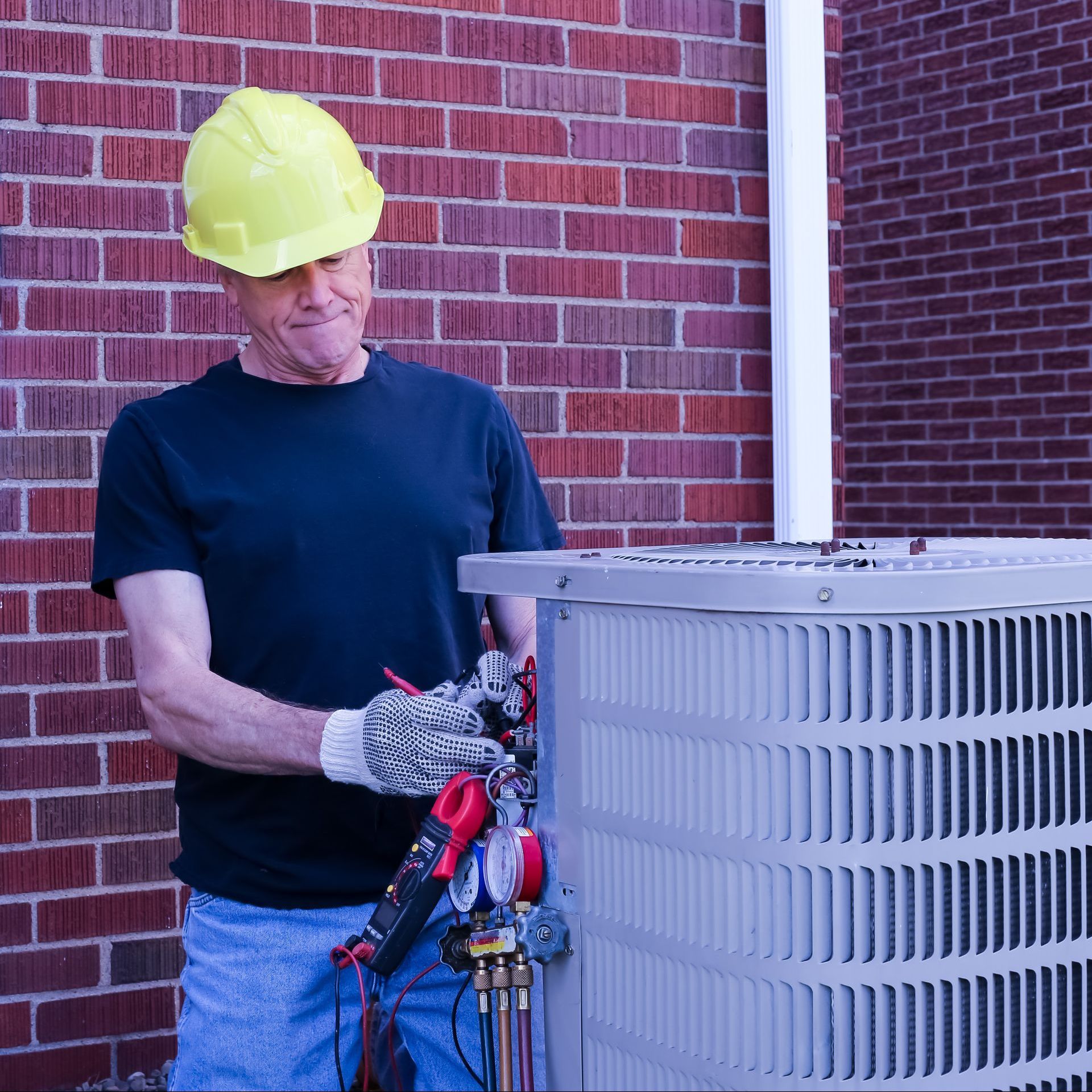 Cooling Technician Repairing Central Air Conditioning System.