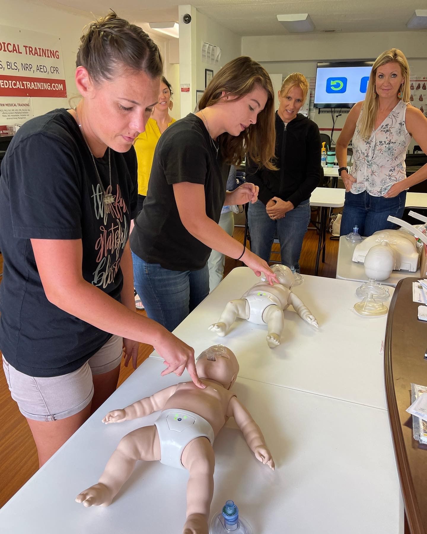 Women Undergoing Medical Training - Warner Robins, GA - TRW Medical Training LLC