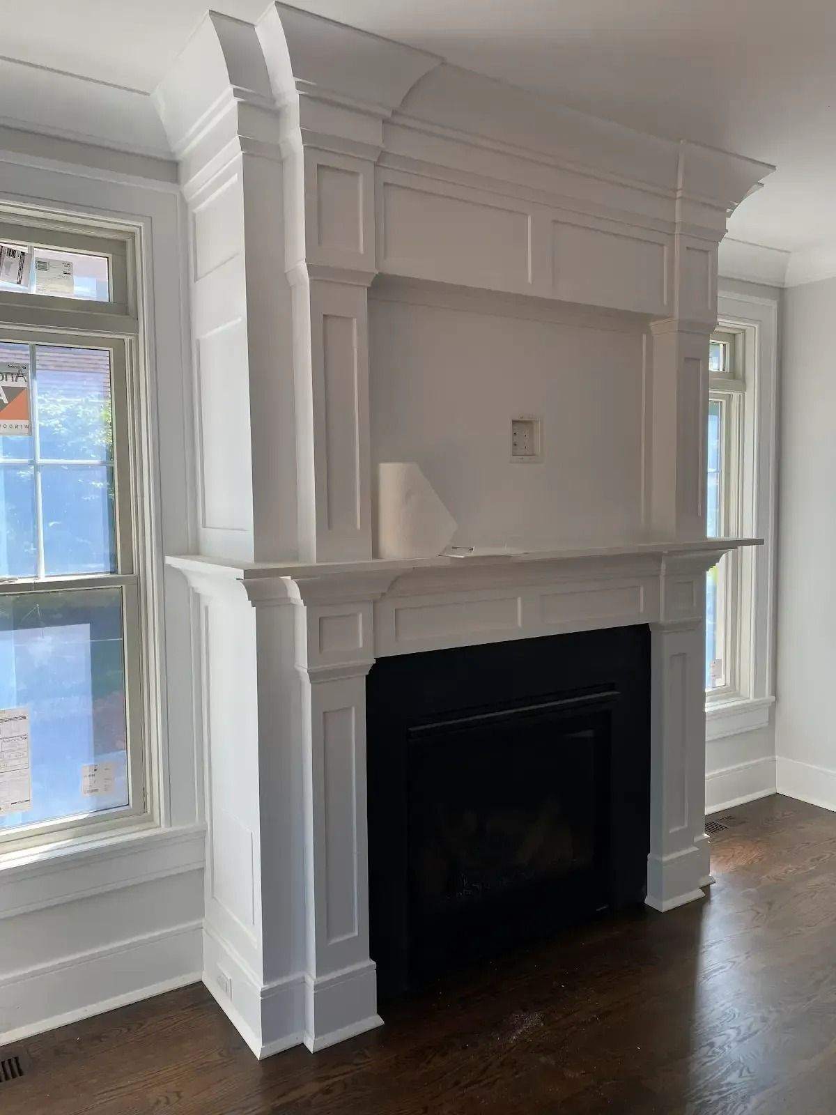 There is a fireplace in the middle of the room