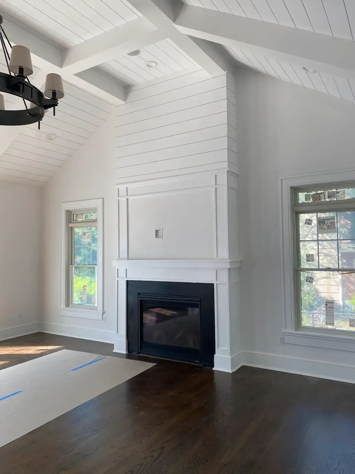 There is a fireplace in the middle of the room