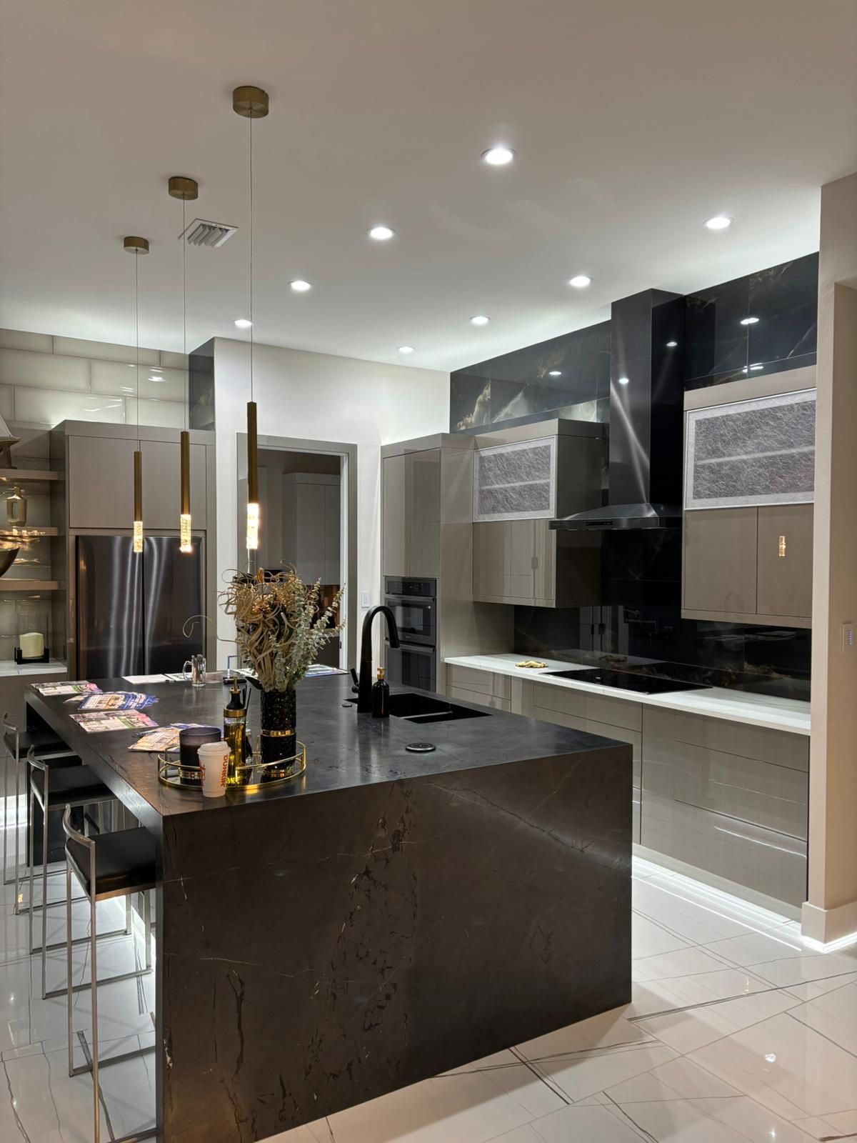 There is a large island in the middle of the kitchen