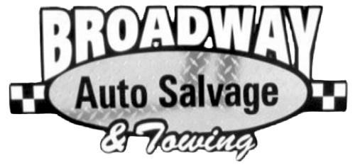 A black and white logo for broadway auto salvage and towing