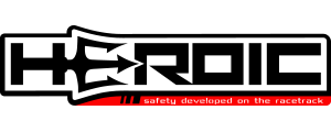 The logo for heroic safety developed on the race track