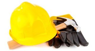 Protective gloves with hammer - Building Remodeling Services in Grand Rapids, MN