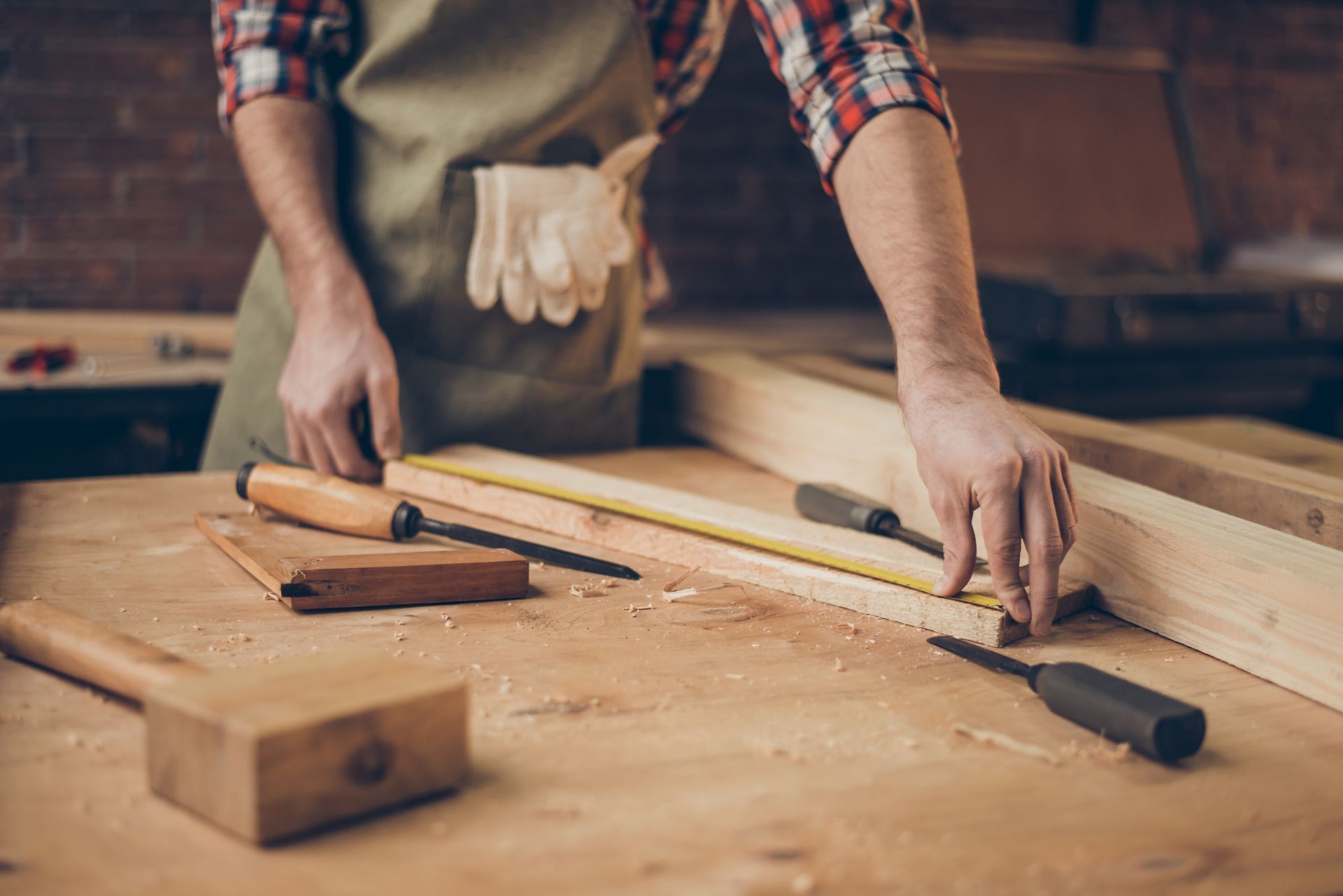 Carpenter cutting door trim