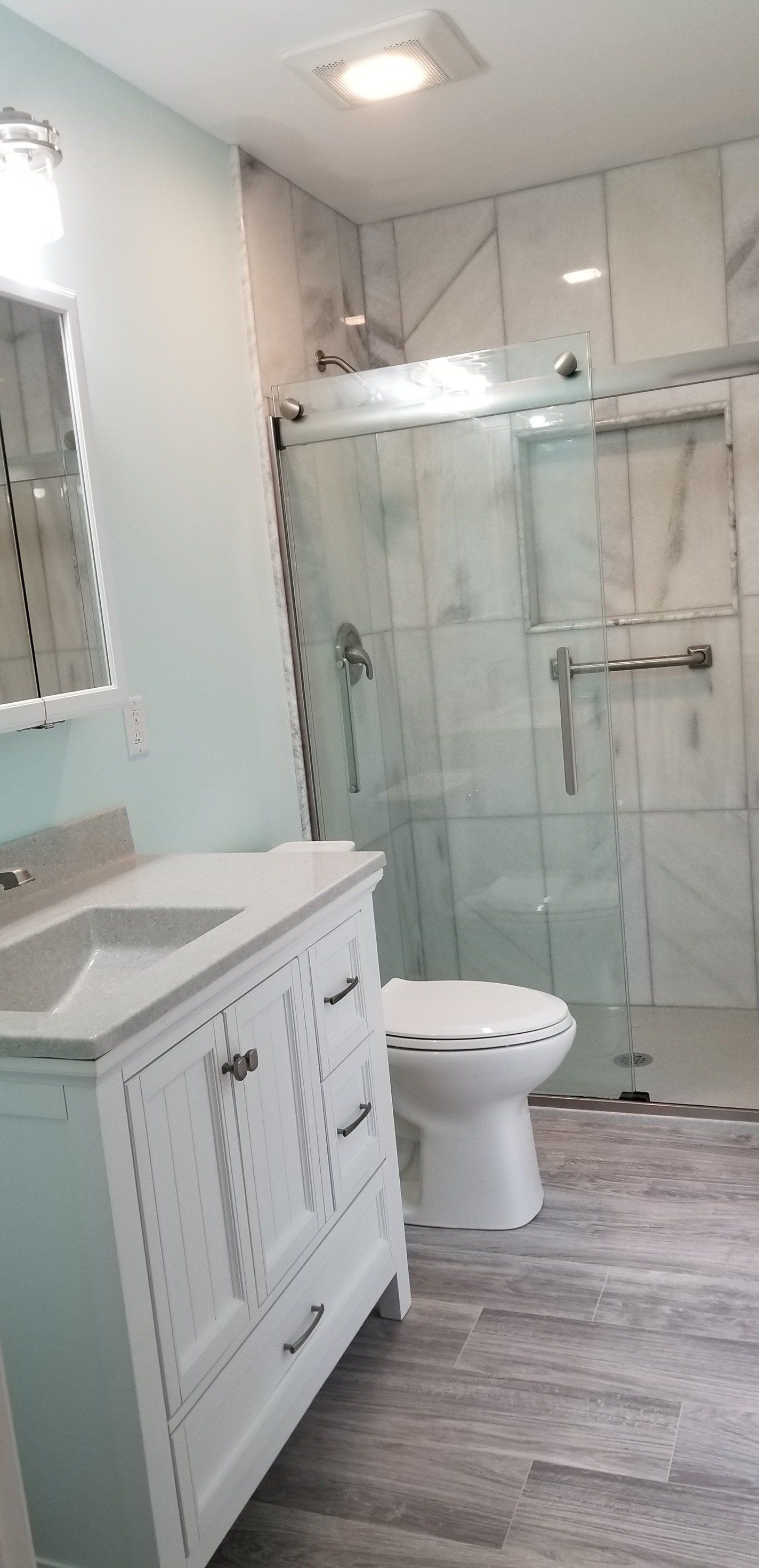 Remodeled bathroom with glass shower