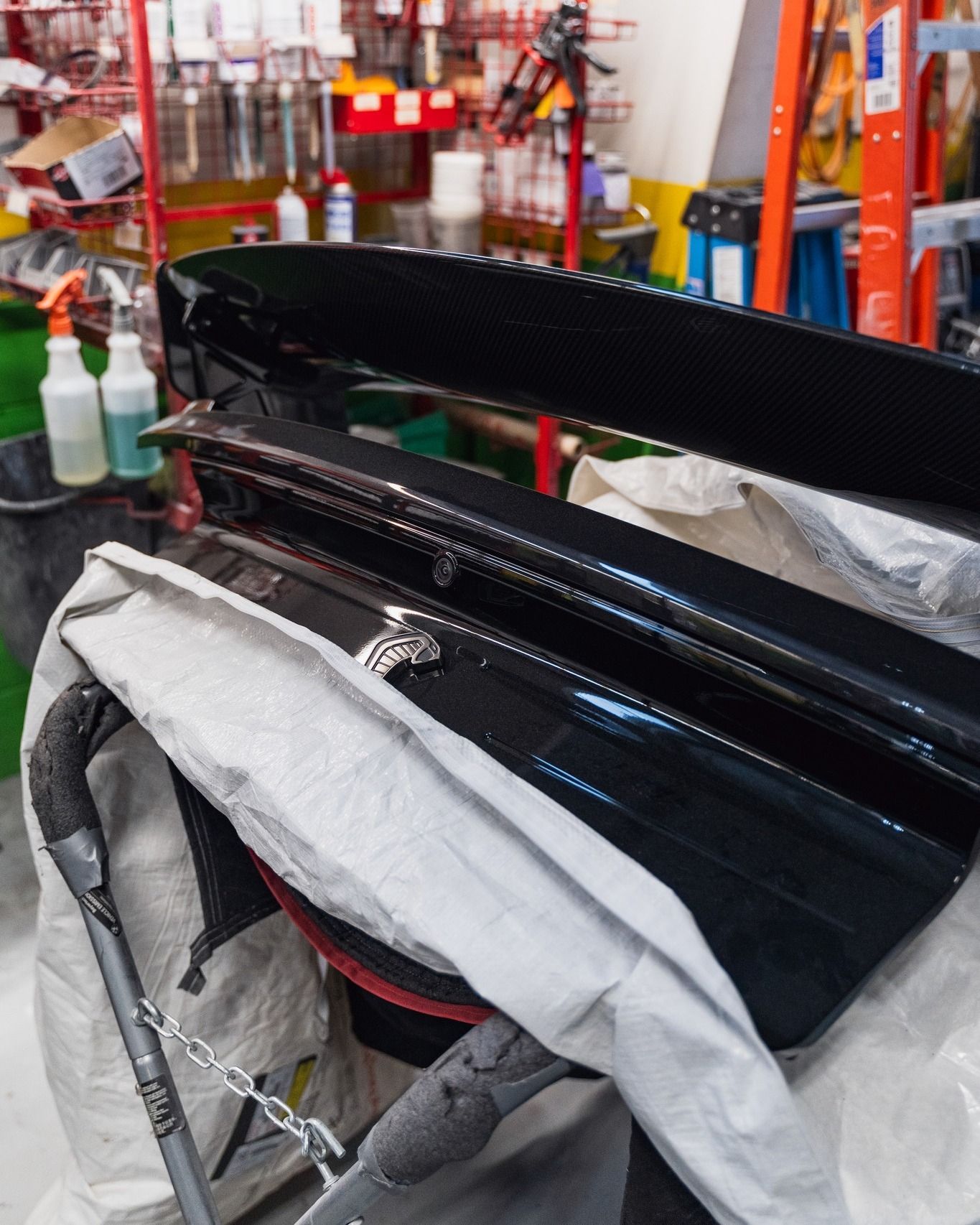 Car Bumper Placed On Repair Stand In Shop | D&V Autobody Overland