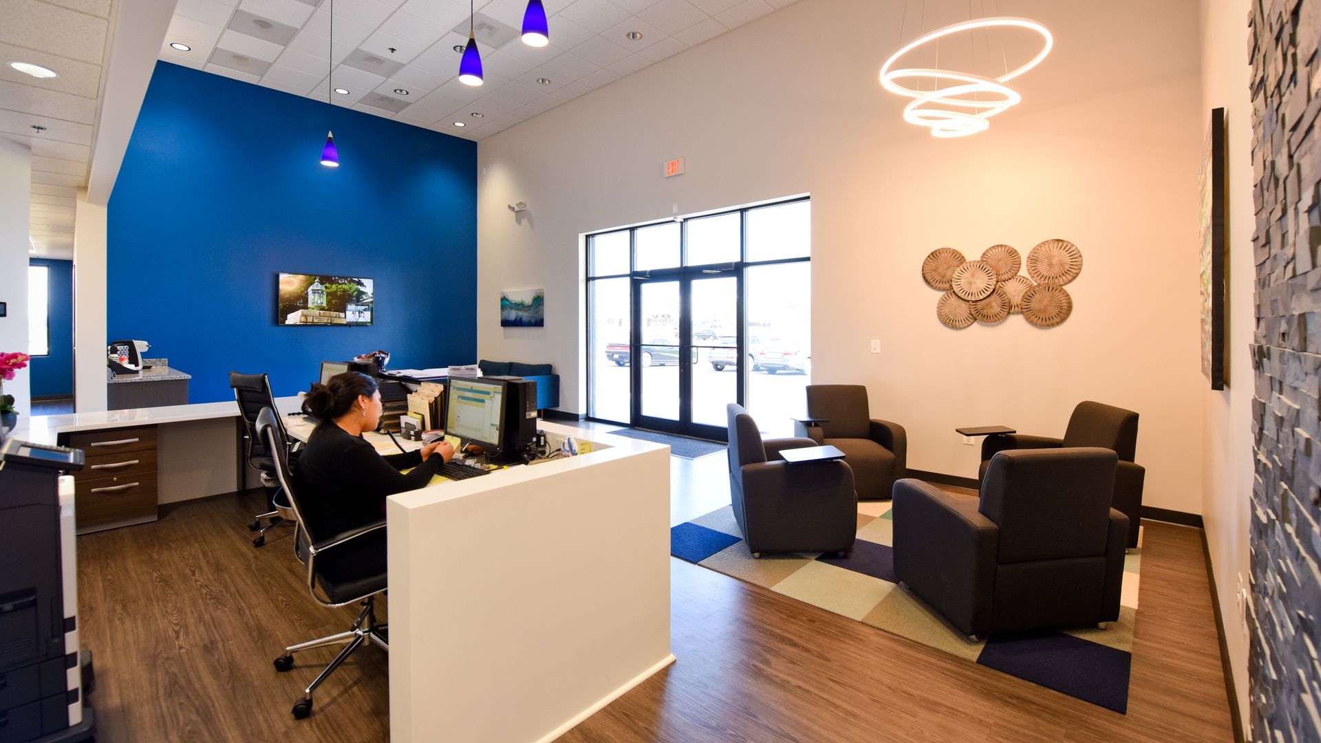 Modern Office Area With Reception Desk And Lighting | D&V Autobody