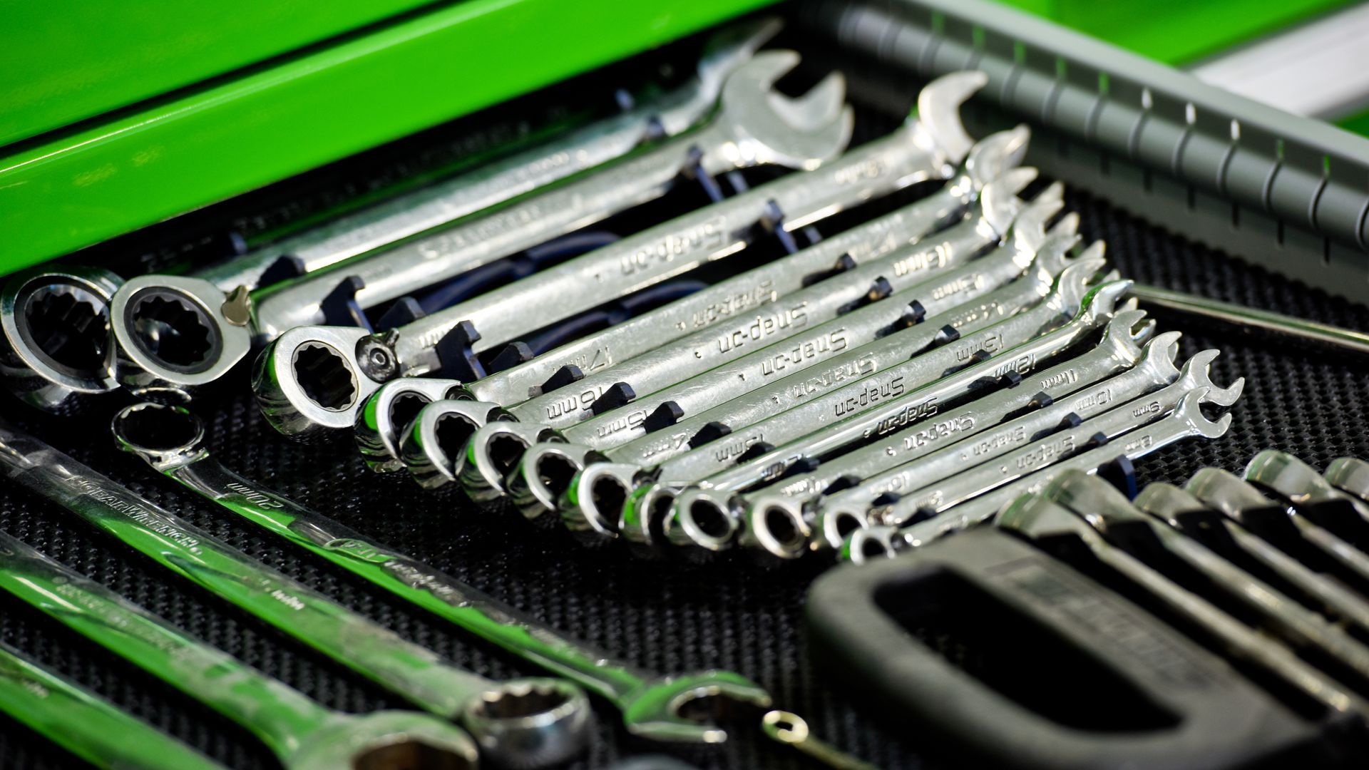 Close Up Of Wrenches On Green Workbench | D&V Autobody