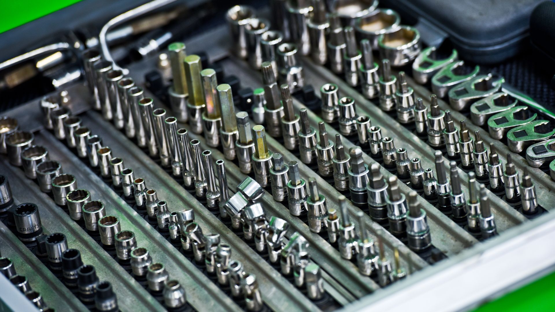 Close Up Of Assorted Automotive Drill Bits And Tools | D&V Autobody Masters