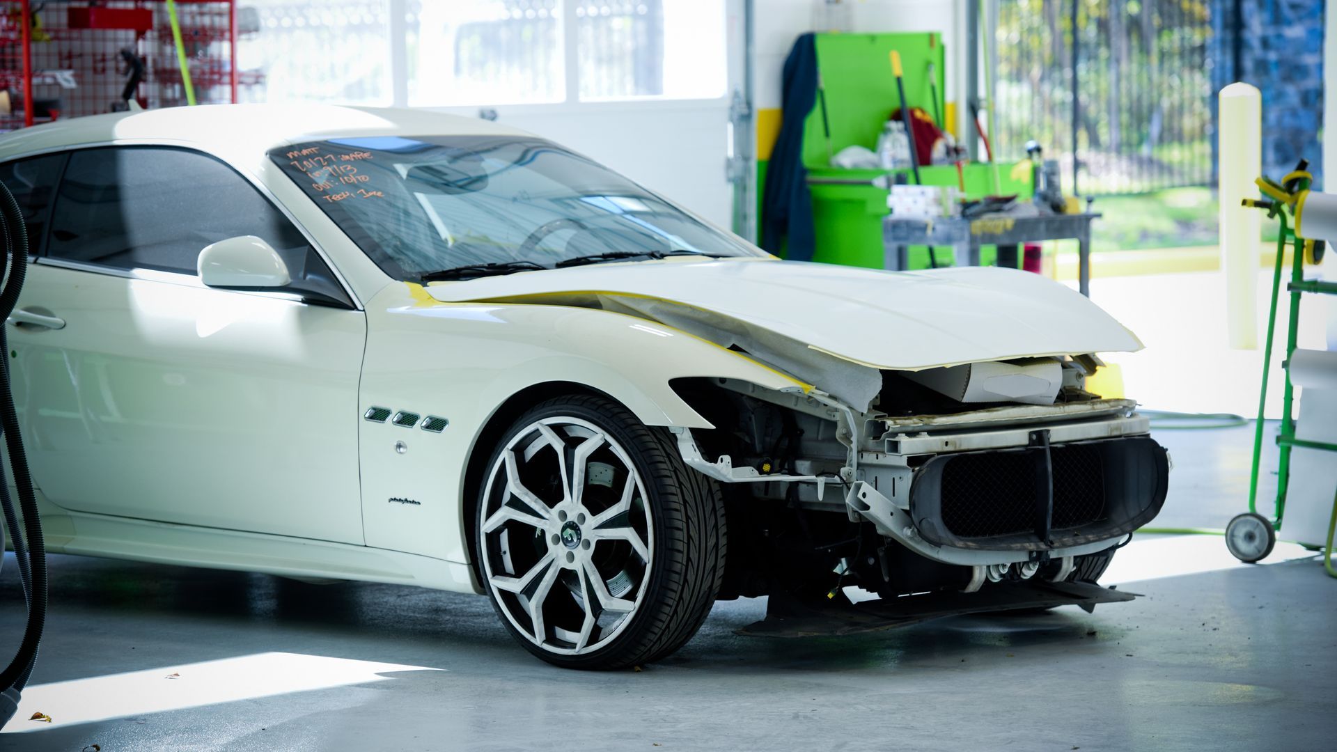 White Maserati Inside Auto Body Repair Facility | D&V Autobody