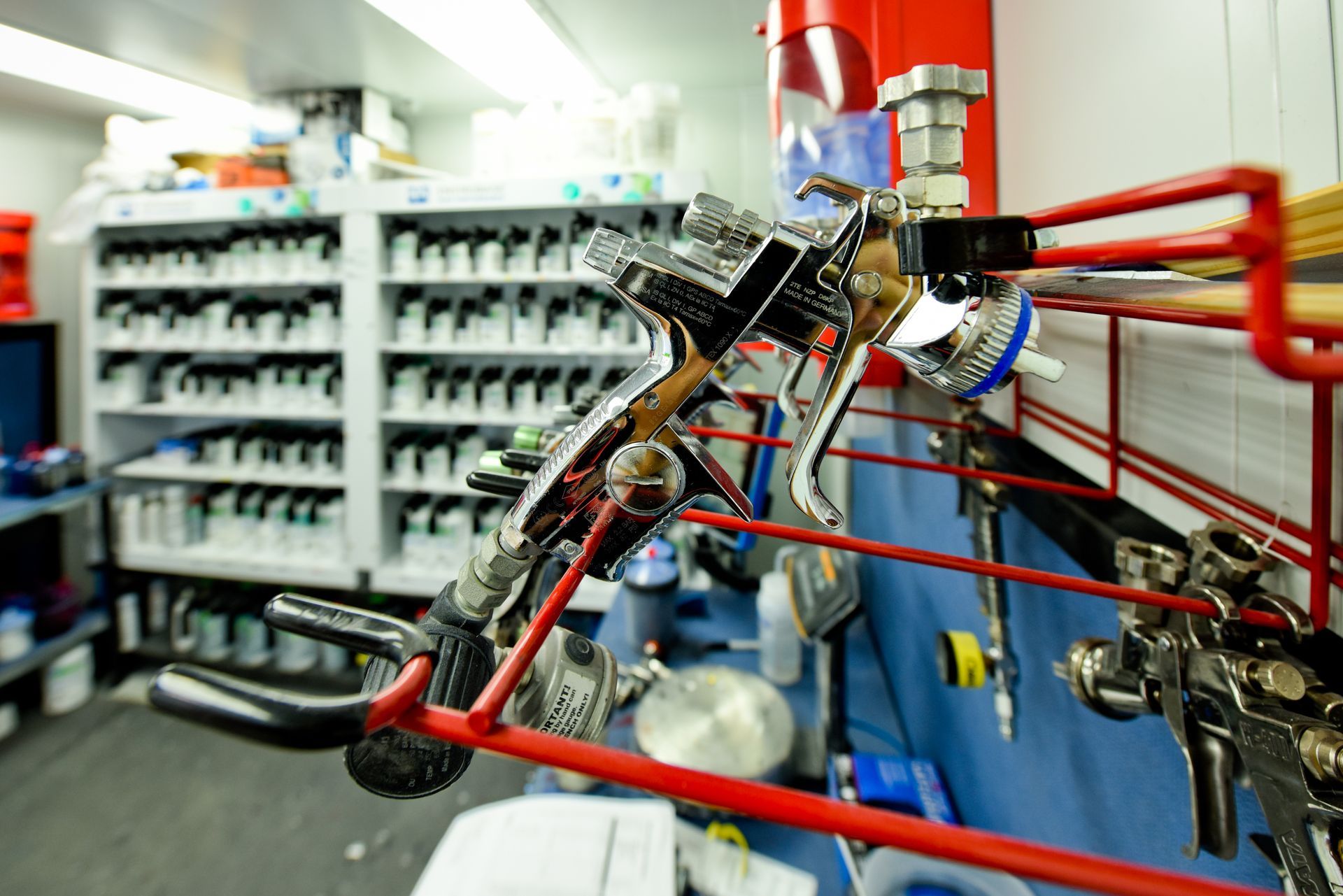 Wall Storage System With Paint Bottles | D&V Autobody