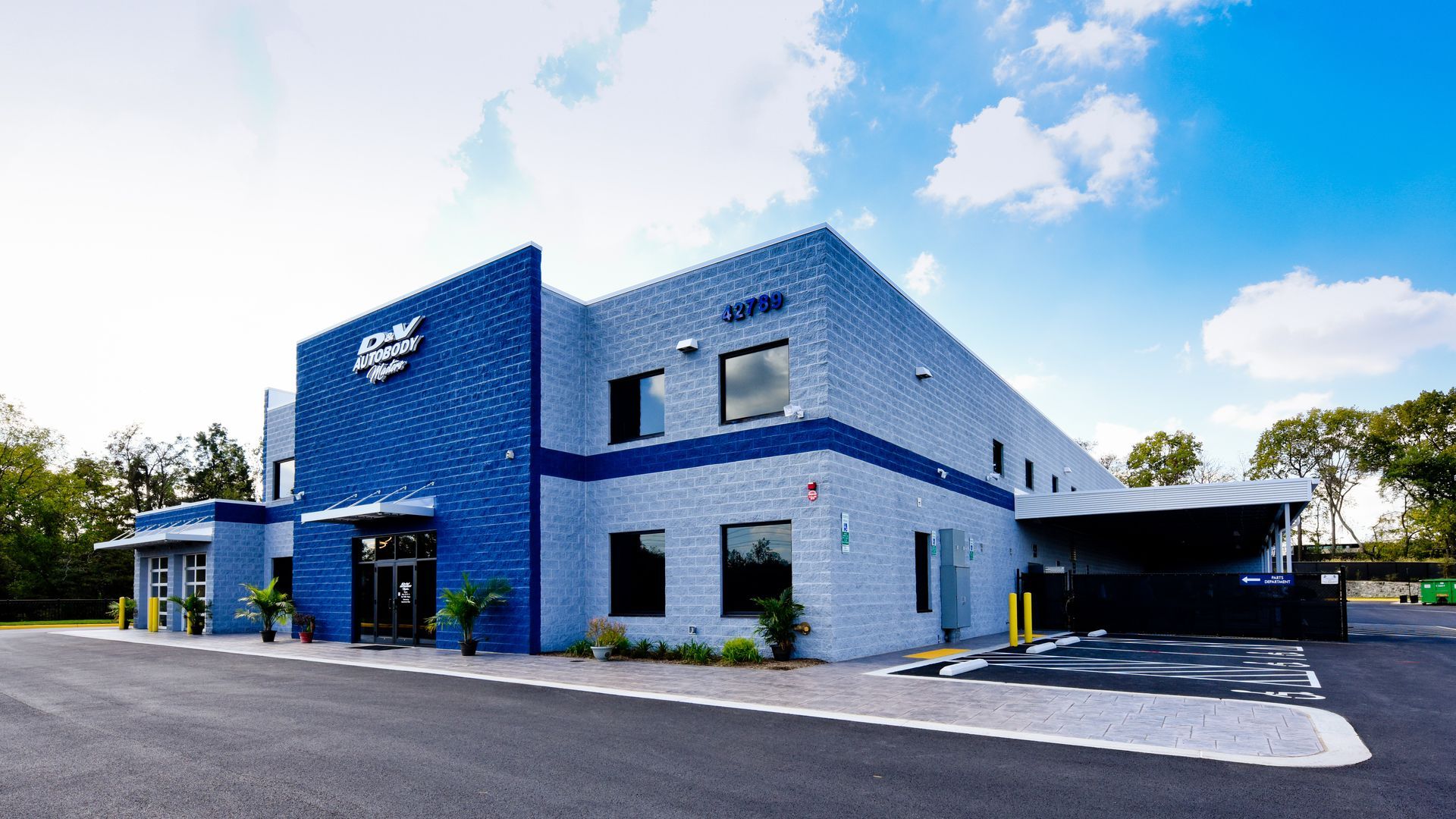 Bright Blue D&V Autobody Facility Exterior | D&V Autobody