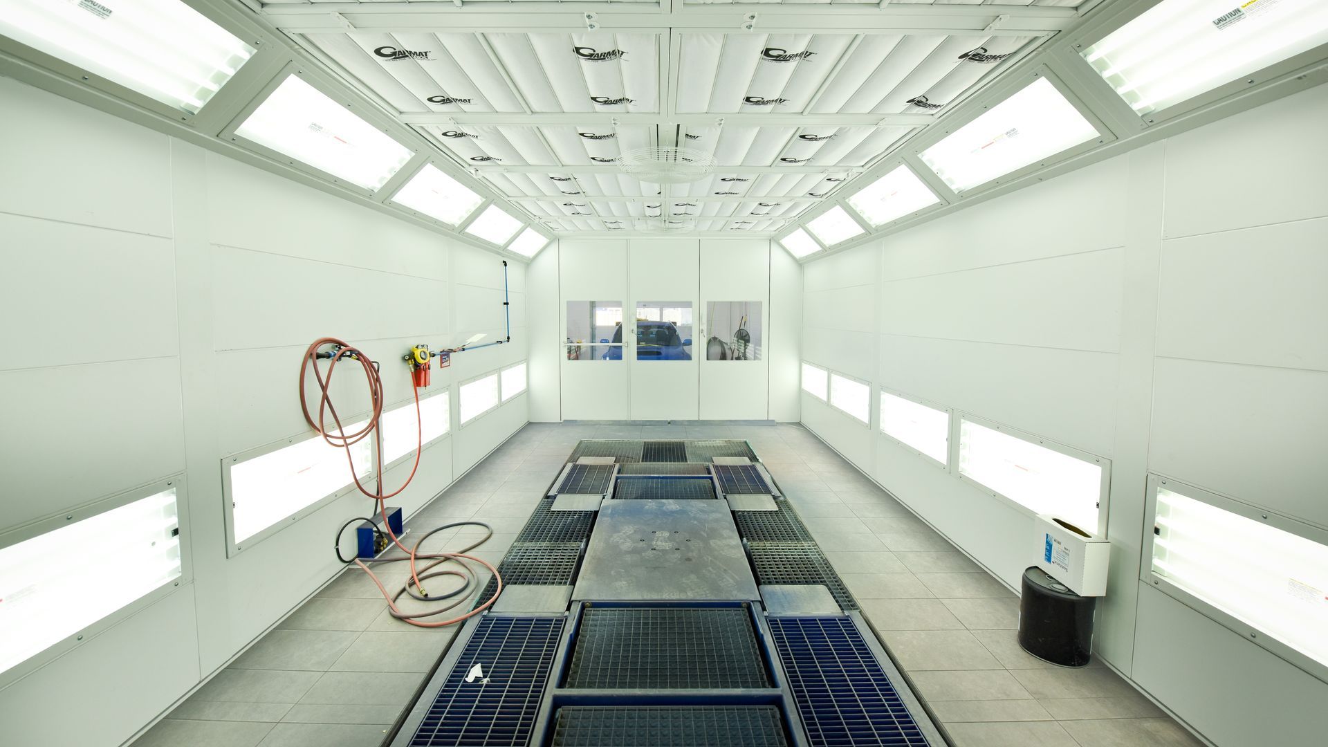Clean Paint Booth Interior With Spray Equipment | D&V Autobody