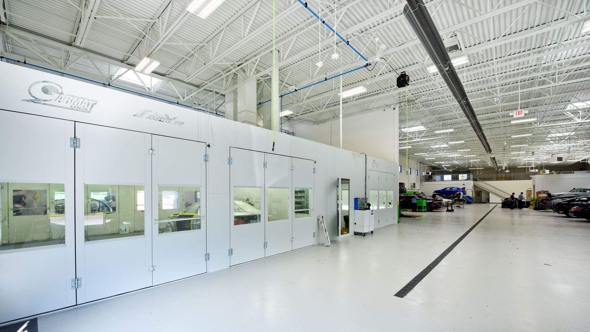 Bright White Paint Booth Interior With Glass Doors | D&V Autobody