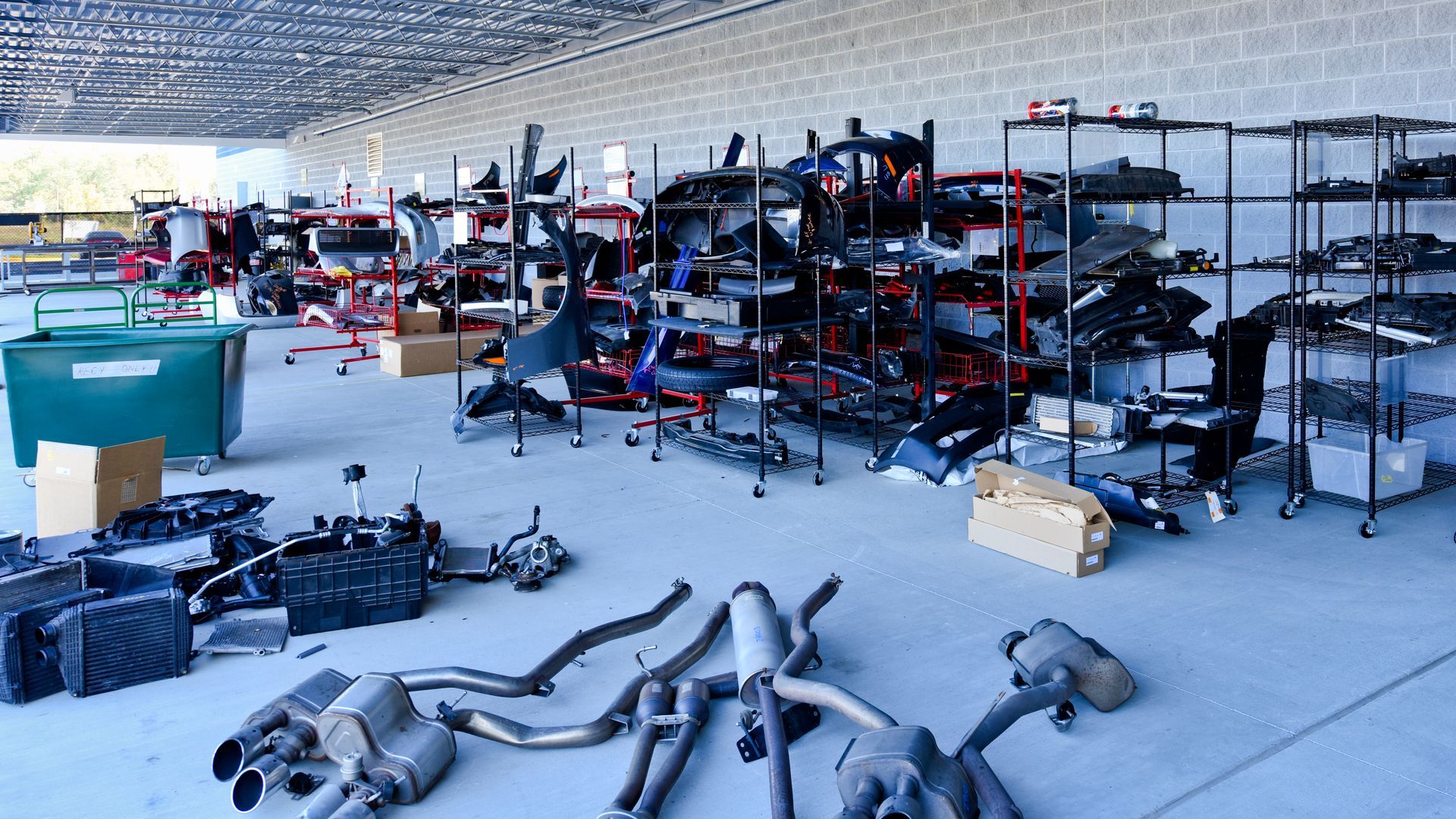Automotive Parts And Supplies Stored On Racks | D&V Autobody