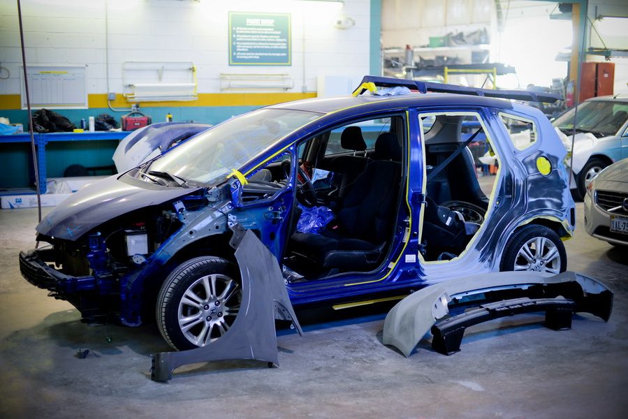 Blue Car Frame Being Repaired In Shop | D&V Autobody