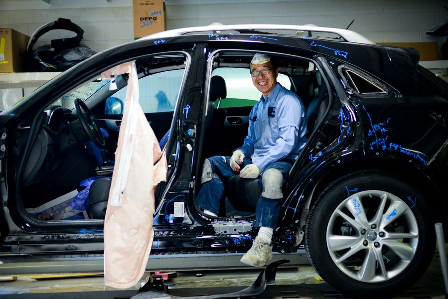 Black Sedan With Interior Exposed For Repairs | D&V Autobody
