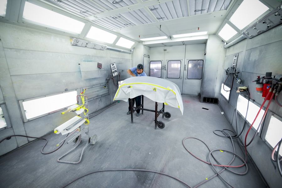 Spray Booth With Vehicle Masked For Painting | D&V Autobody