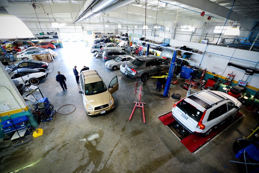 Wide View Of Auto Body Shop Floor With Vehicles | D&V Autobody