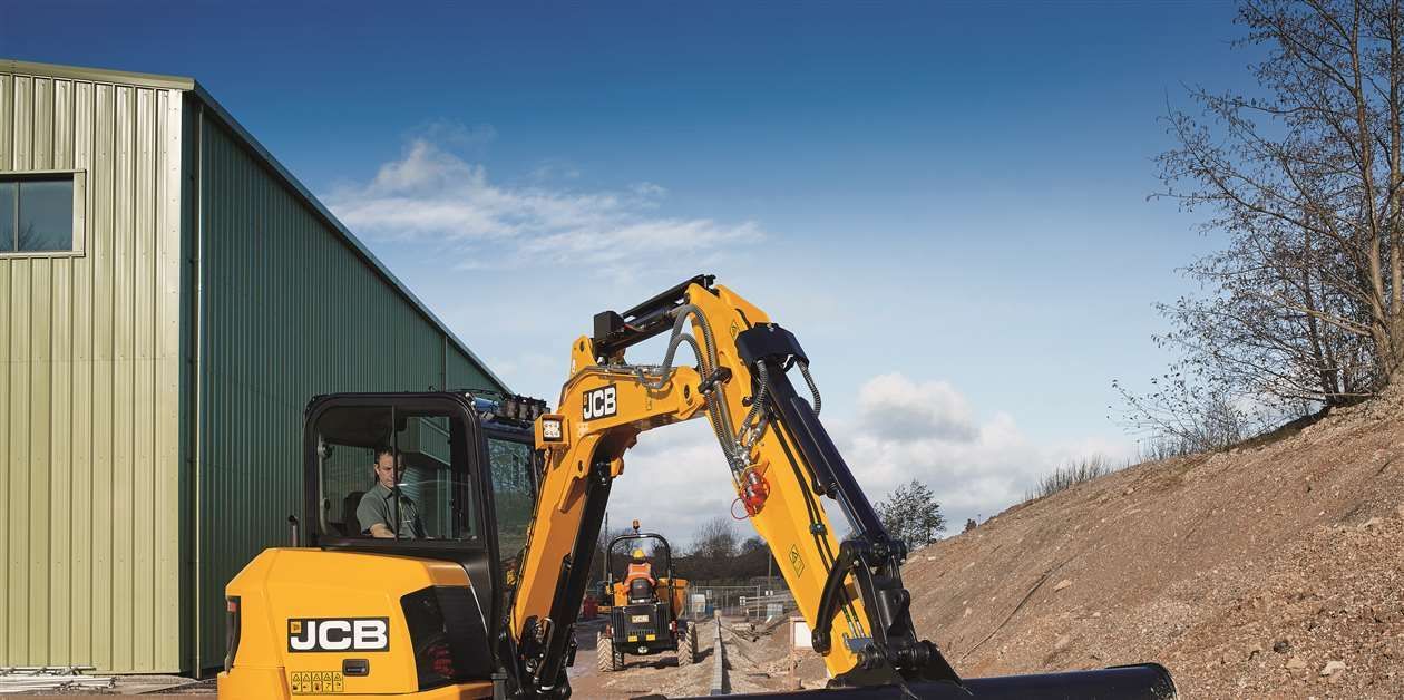 A Yellow Jcb Excavator Digging Earth — Allquip Rentals Pty Ltd in Cooroy, QLD