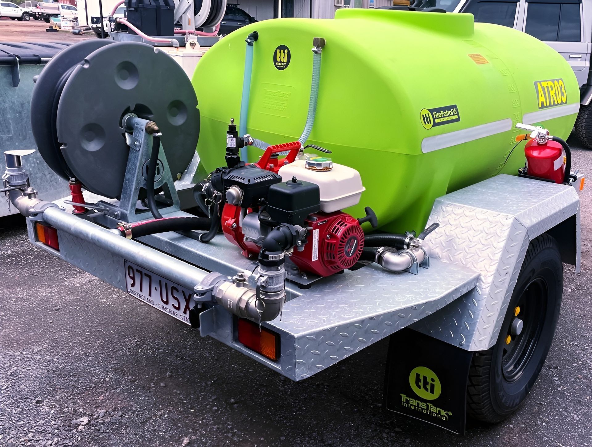 Green Water Tank Trailer With Hose Reel — Allquip Rentals Pty Ltd in Cooroy, QLD