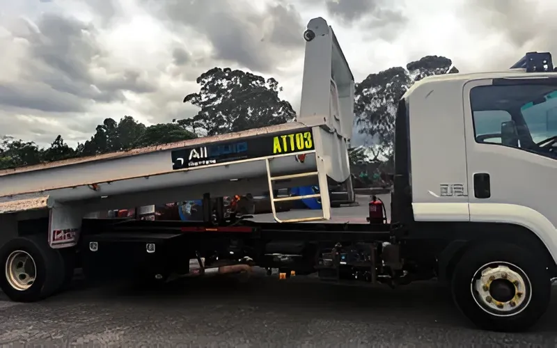 White Tow Truck With Raised Bed, Black Chassis — Allquip Rentals Pty Ltd in Cooroy, QLD