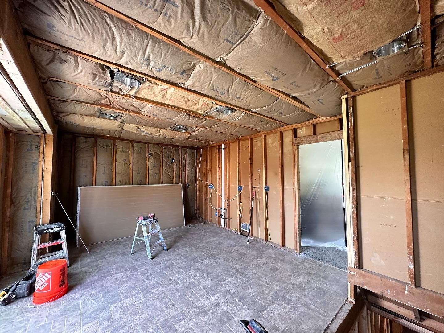 There is a ladder in the middle of the room.