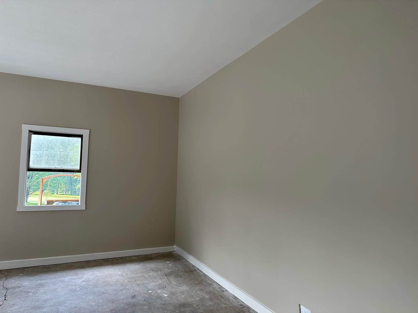 There is a window in the middle of the room.