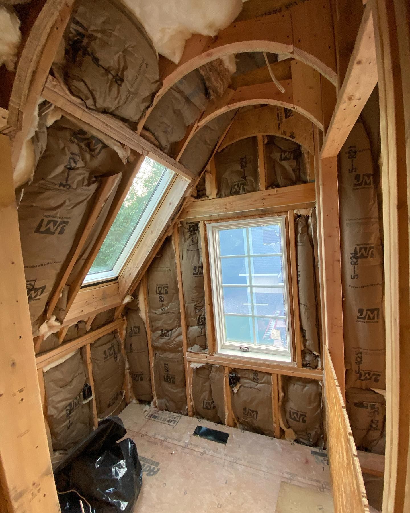 A room with a window and a lot of insulation