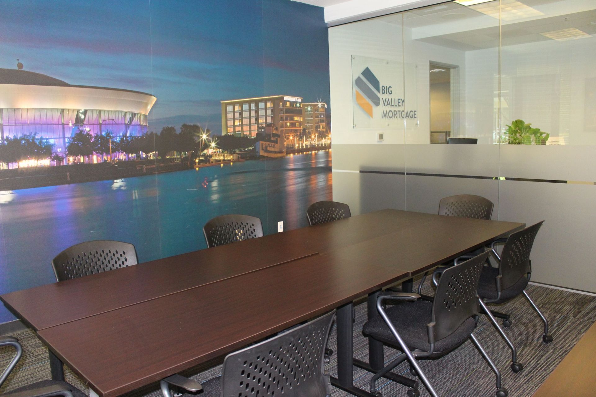 A conference room with a large table and chairs | Mortgage Company in Roseville, CA