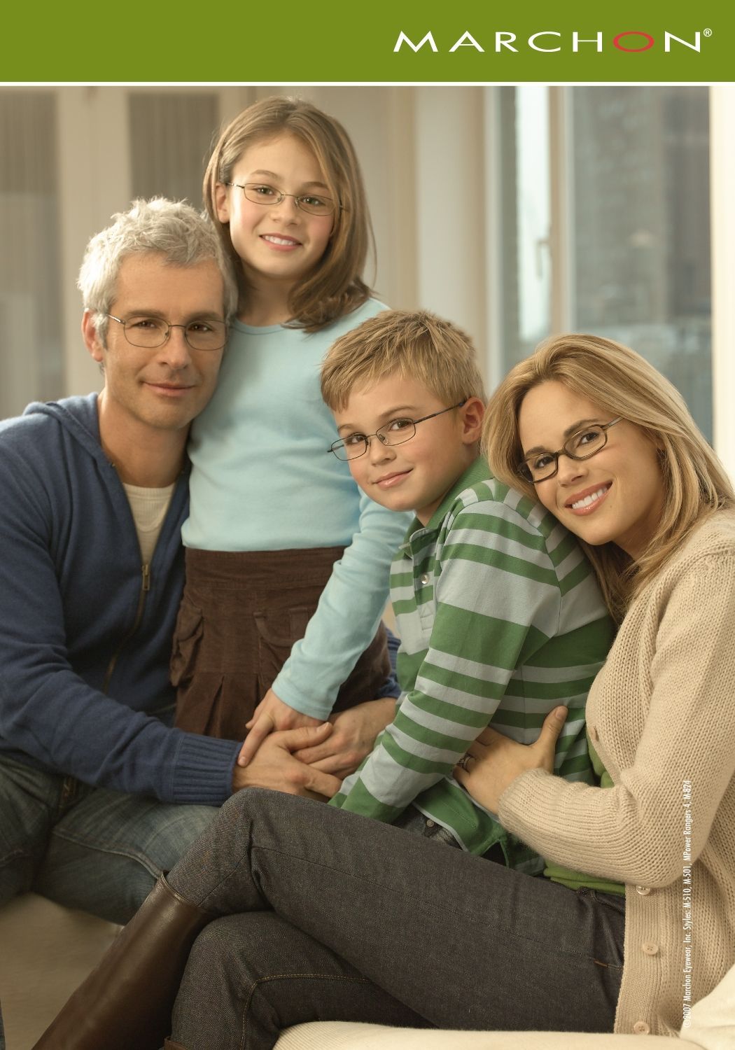 A family wearing glasses is posing for a picture