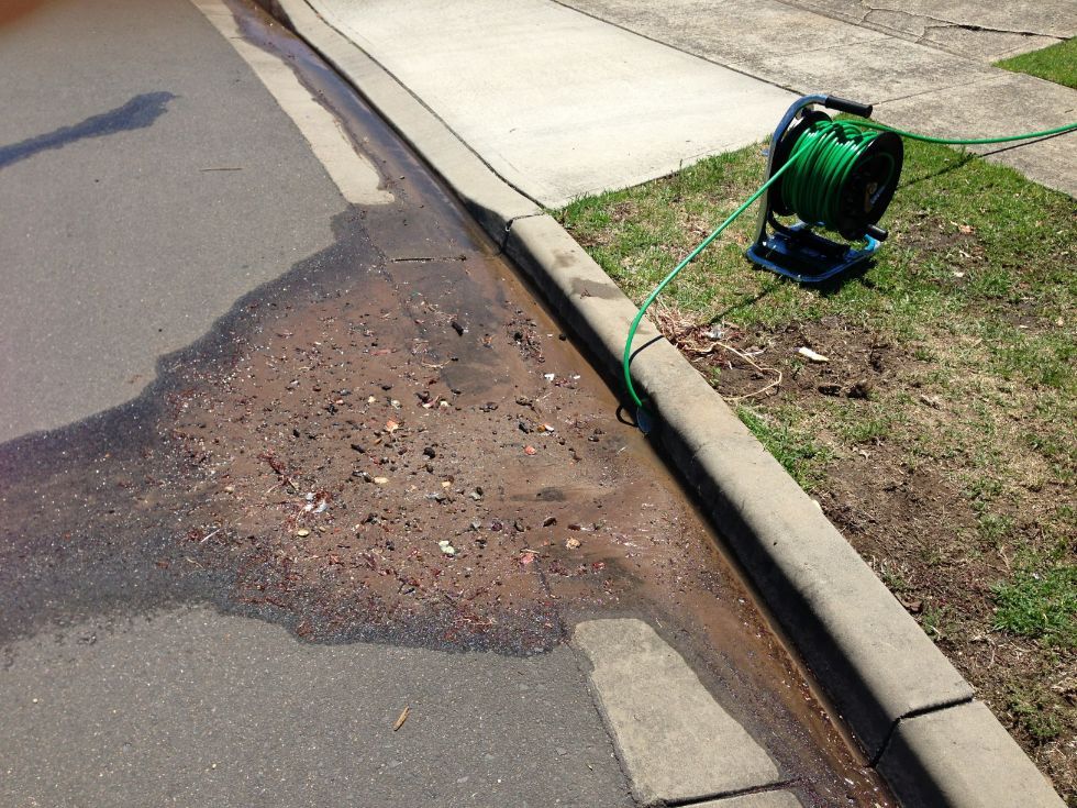 Hose Into The Drainage — Plumbing Services in Bathurst, NSW
