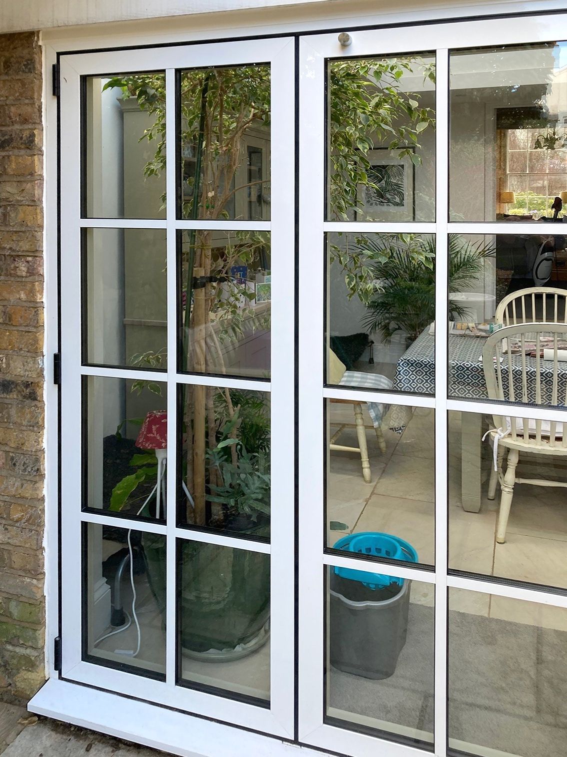 Timber Doors Converted to modern aluminium Bi-folds London