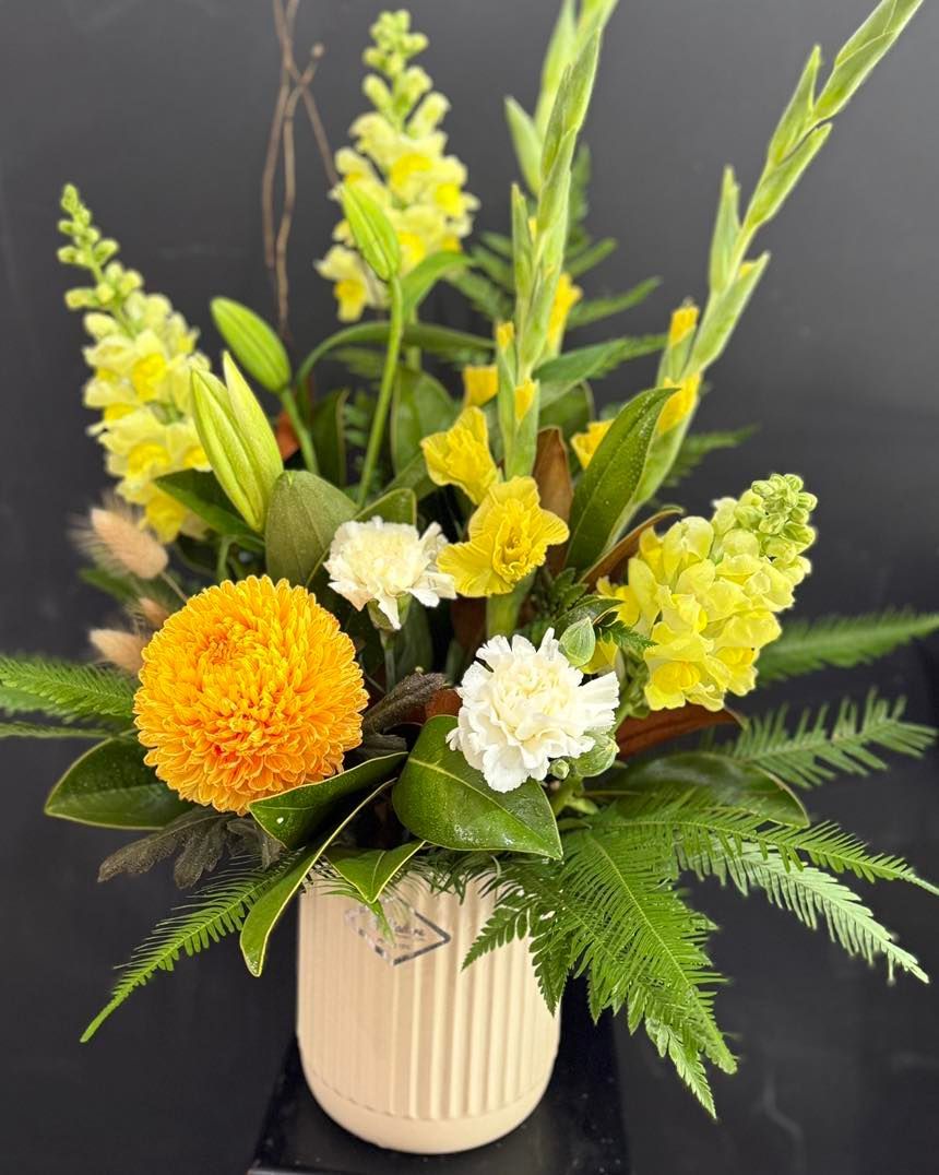 Floral Arrangement in a Beige Vase With Yellow and White Flowers — J'adore Flowers & Gifts Cairns in Earlville, QLD