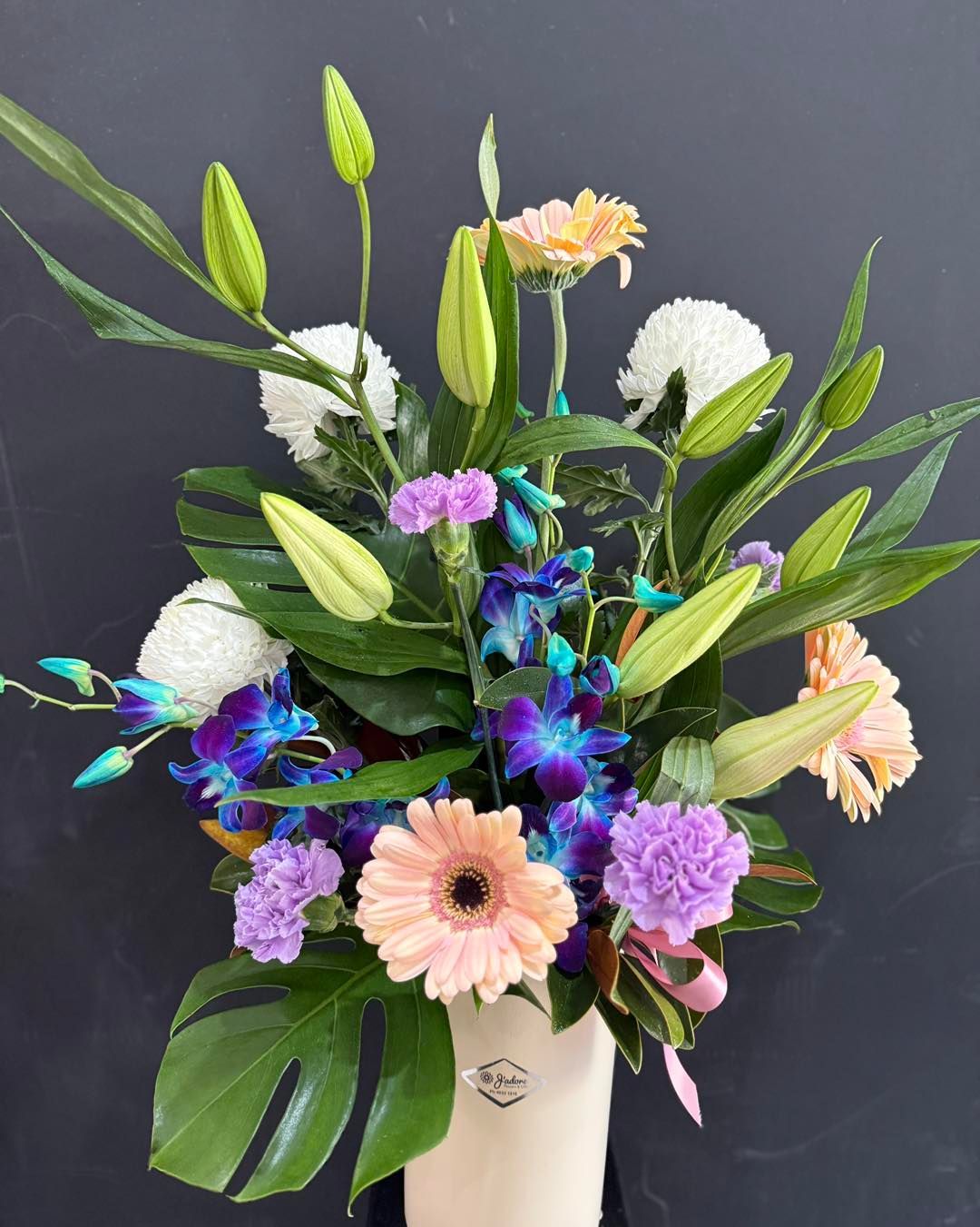 Floral Arrangement With Blue, Yellow, and Burgundy Blooms — J'adore Flowers & Gifts Cairns in Earlville, QLD