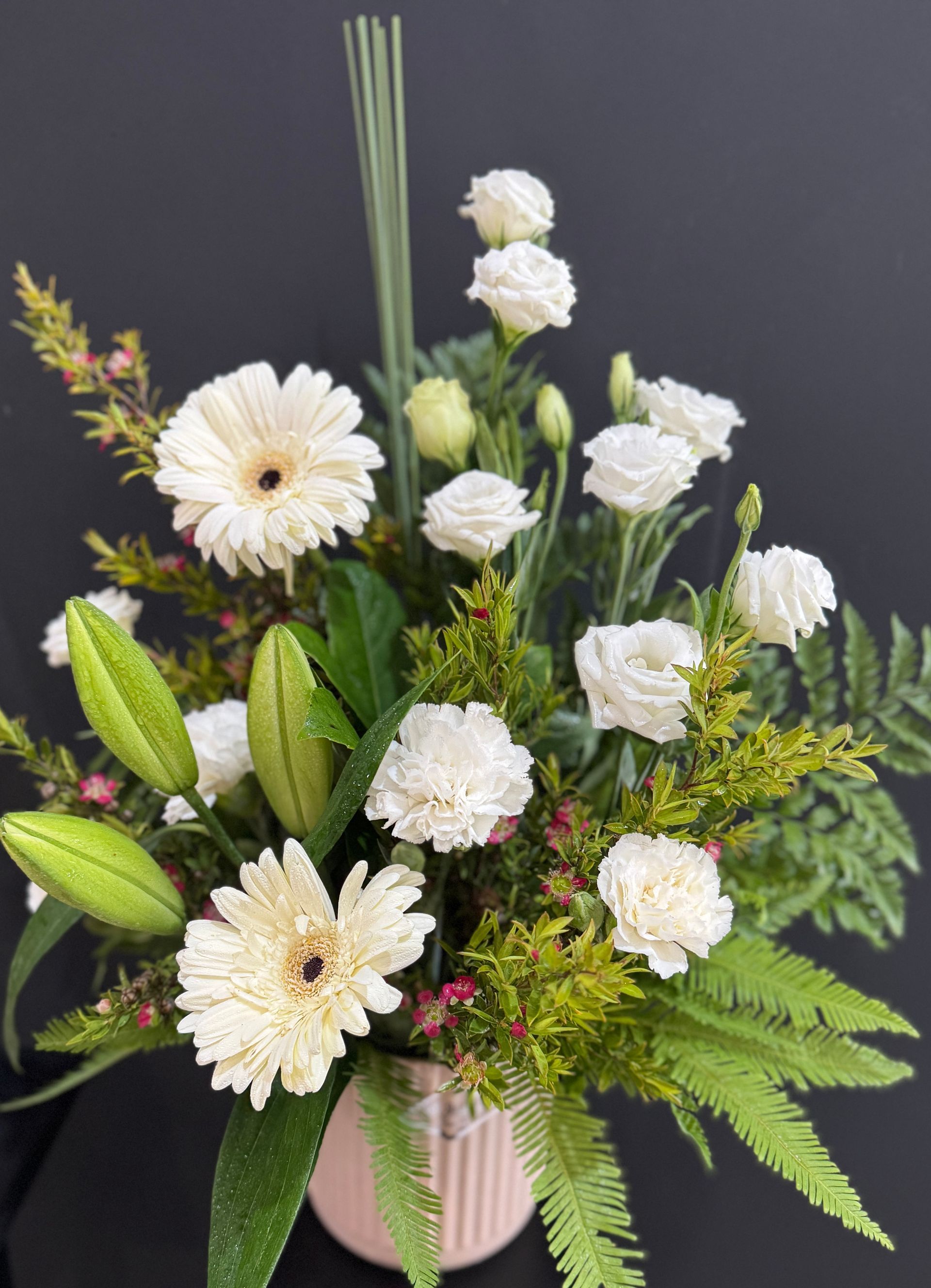 Floral Arrangement in a Beige Vase — J'adore Flowers & Gifts Cairns in Earlville, QLD
