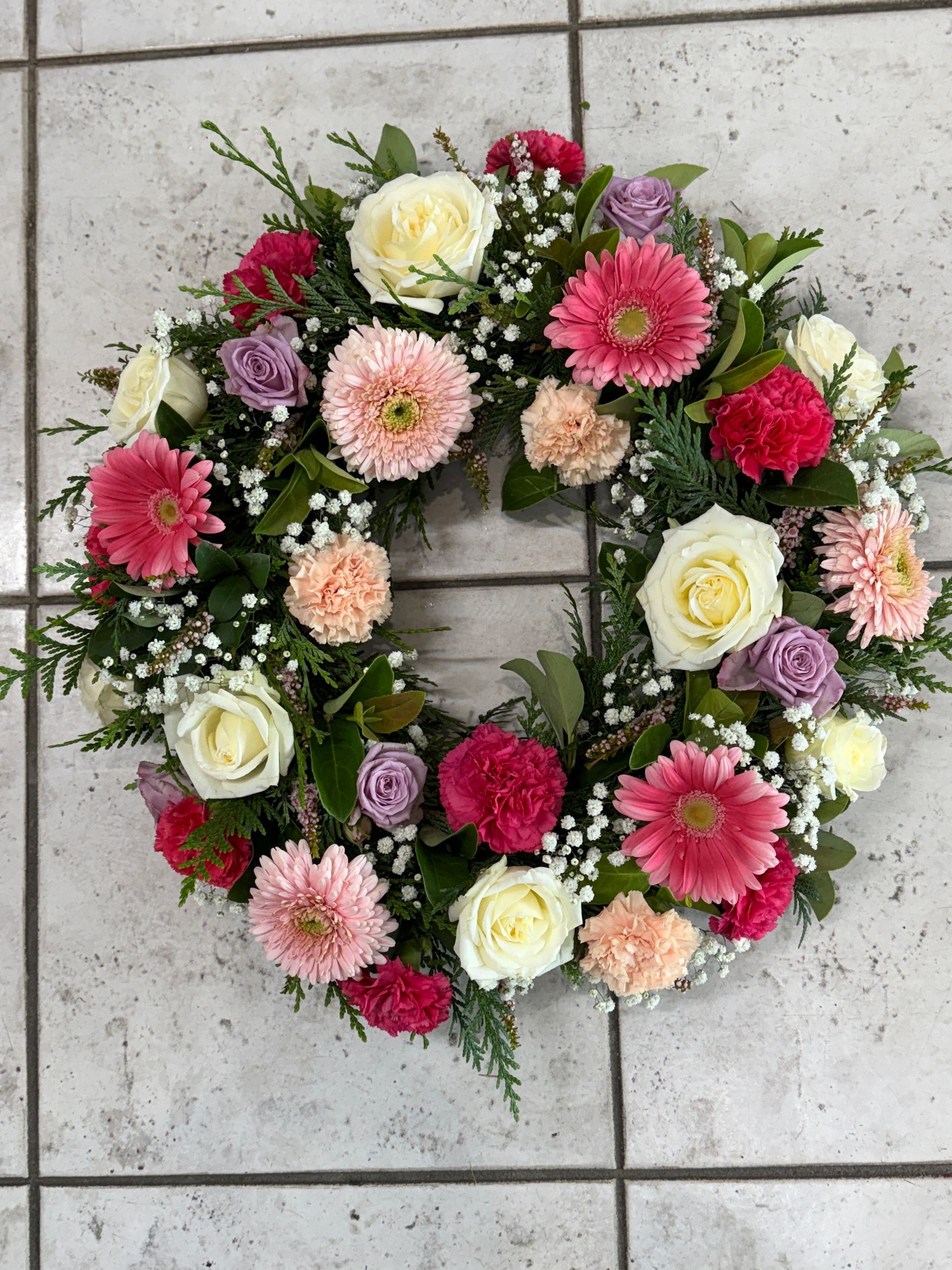 Floral Wreath With Pink, Red, and Cream-colored Blooms and Greenery — J'adore Flowers & Gifts Cairns in Earlville, QLD
