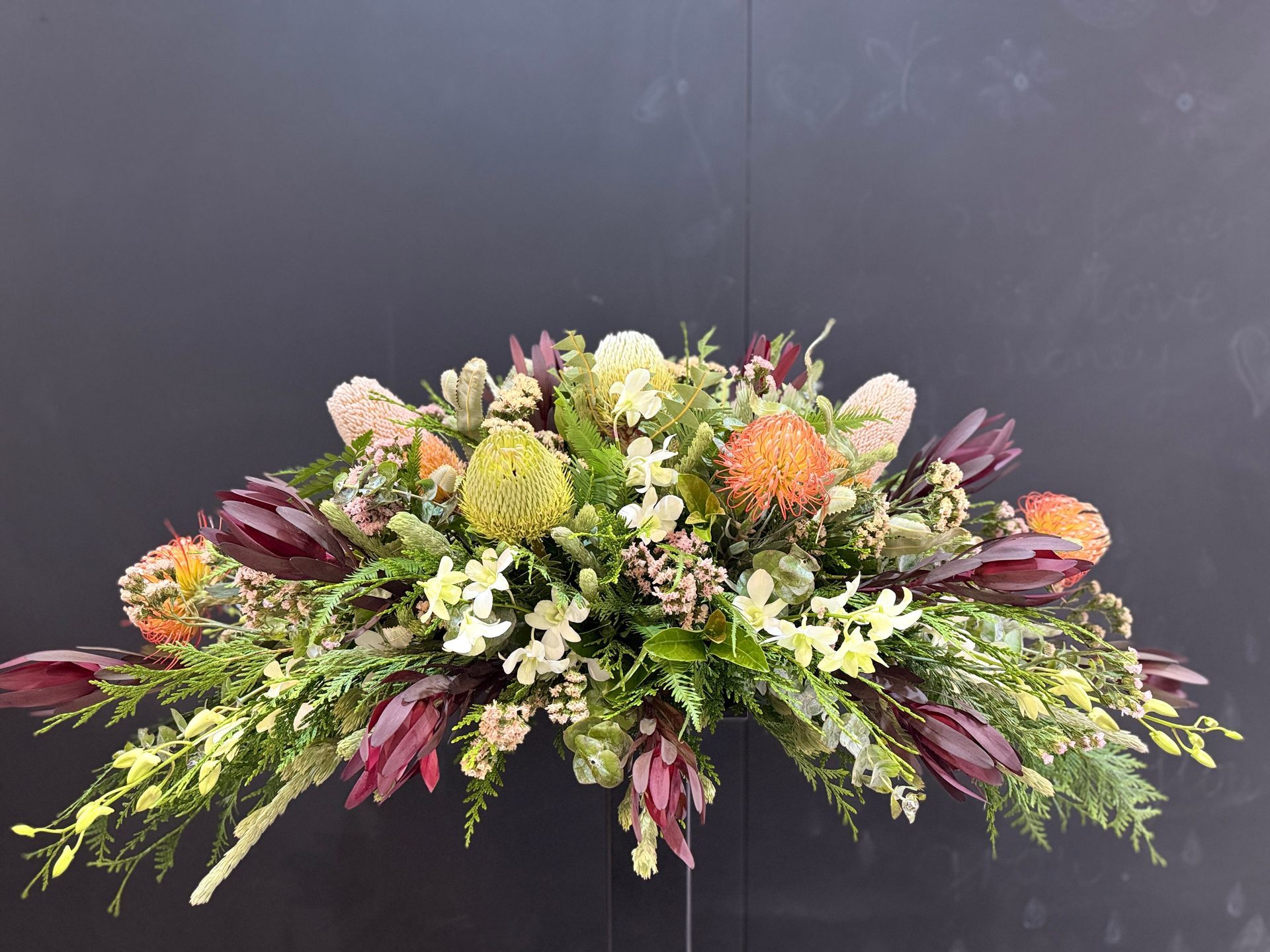 Floral Arrangement With Orange, Cream, and Burgundy Flowers — J'adore Flowers & Gifts Cairns in Earlville, QLD