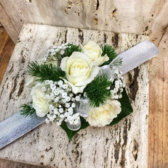 Wrist Corsage With White Roses, Baby's Breath, and a Silver Ribbon — J'adore Flowers & Gifts Cairns in Edmonton, QLD