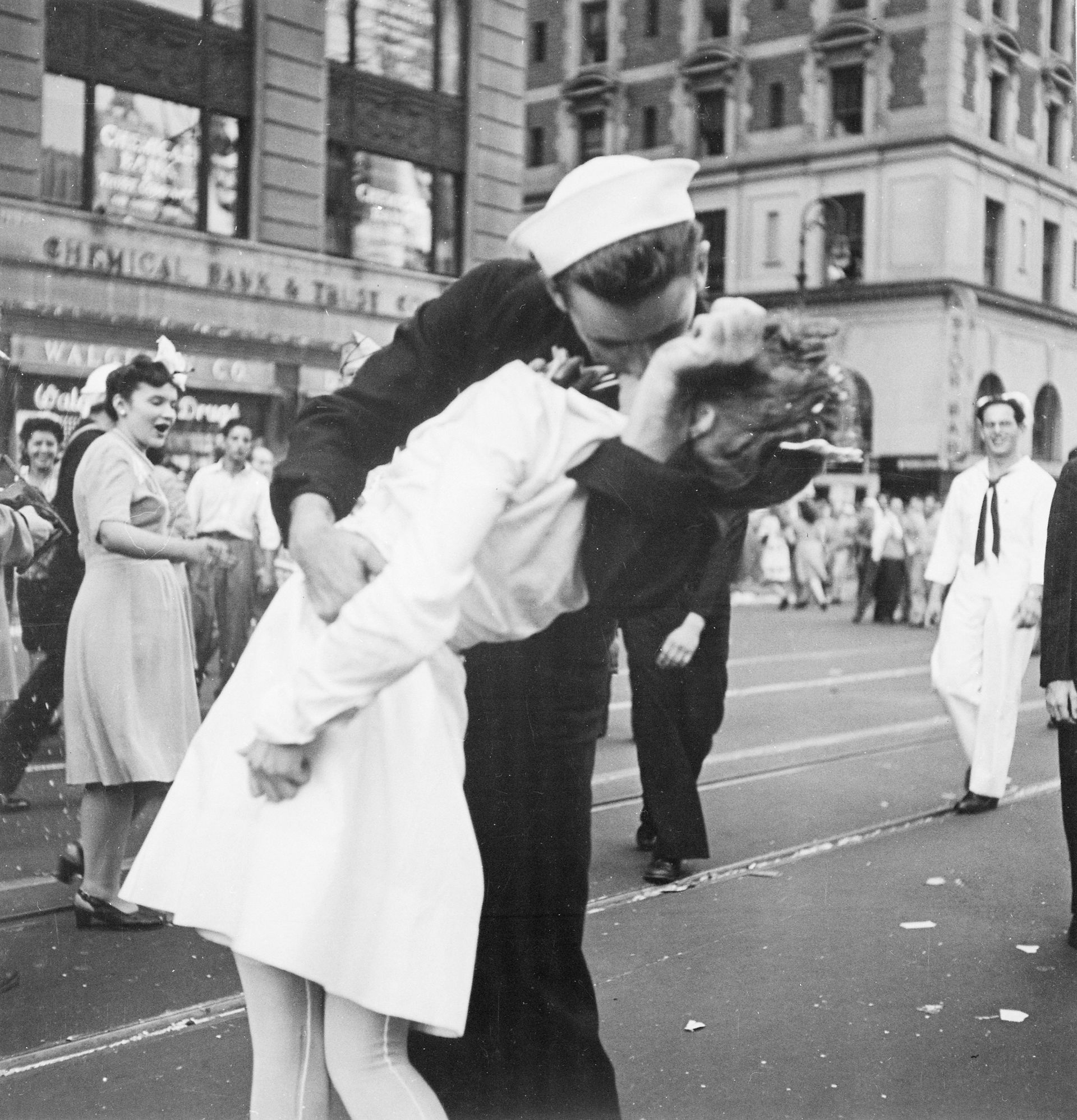 Photo by Victor Jorgenson, US Navy Photojournalist, at Times Square New York on August 14, 1945. Photo is public domain and courtesy of the National Archives and Records Administration.