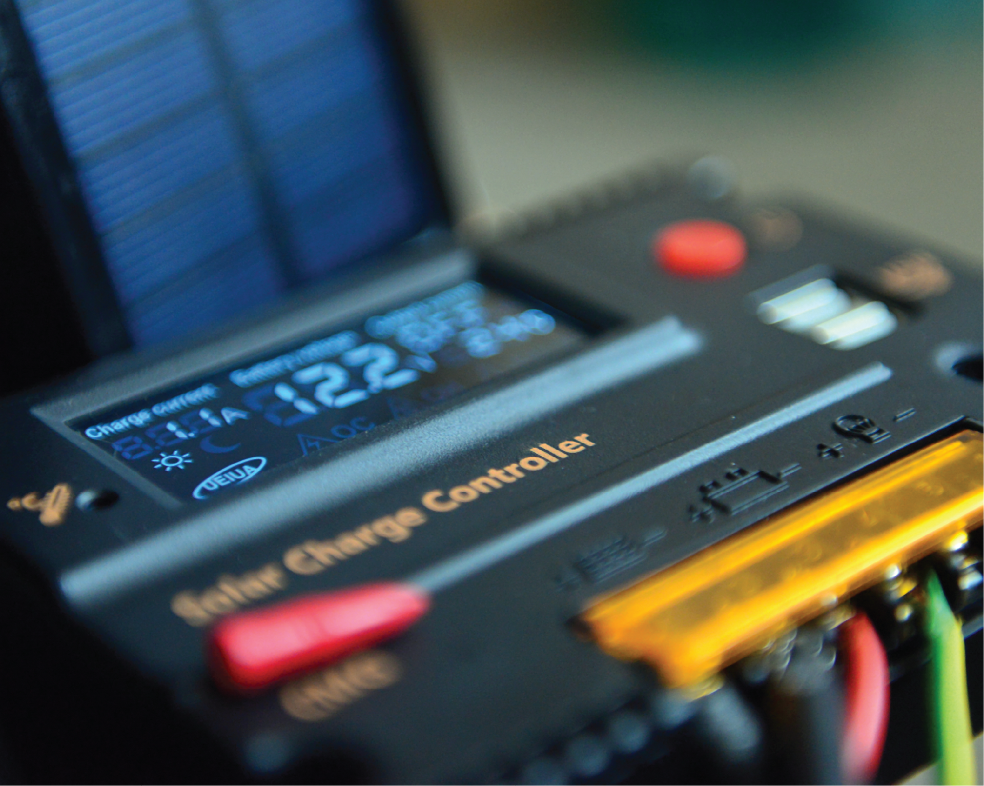 A solar charge controller is sitting on a table