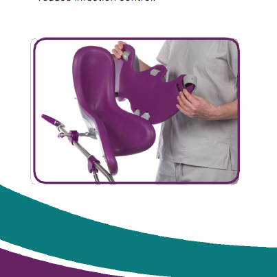 A person is holding a purple chair in their hands