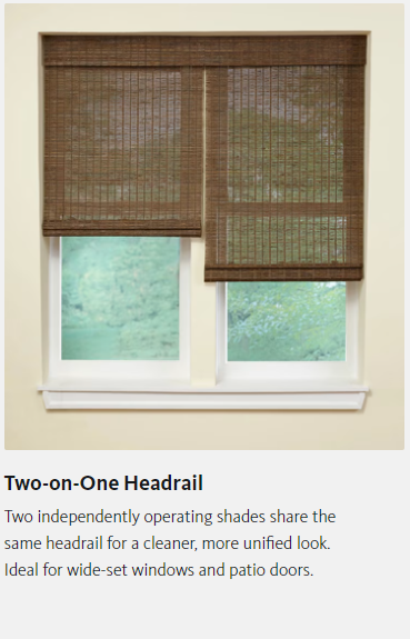 A picture of a window with a bamboo blind on it.