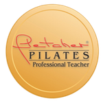 a gold coin that says Fletcher pilates professional teacher