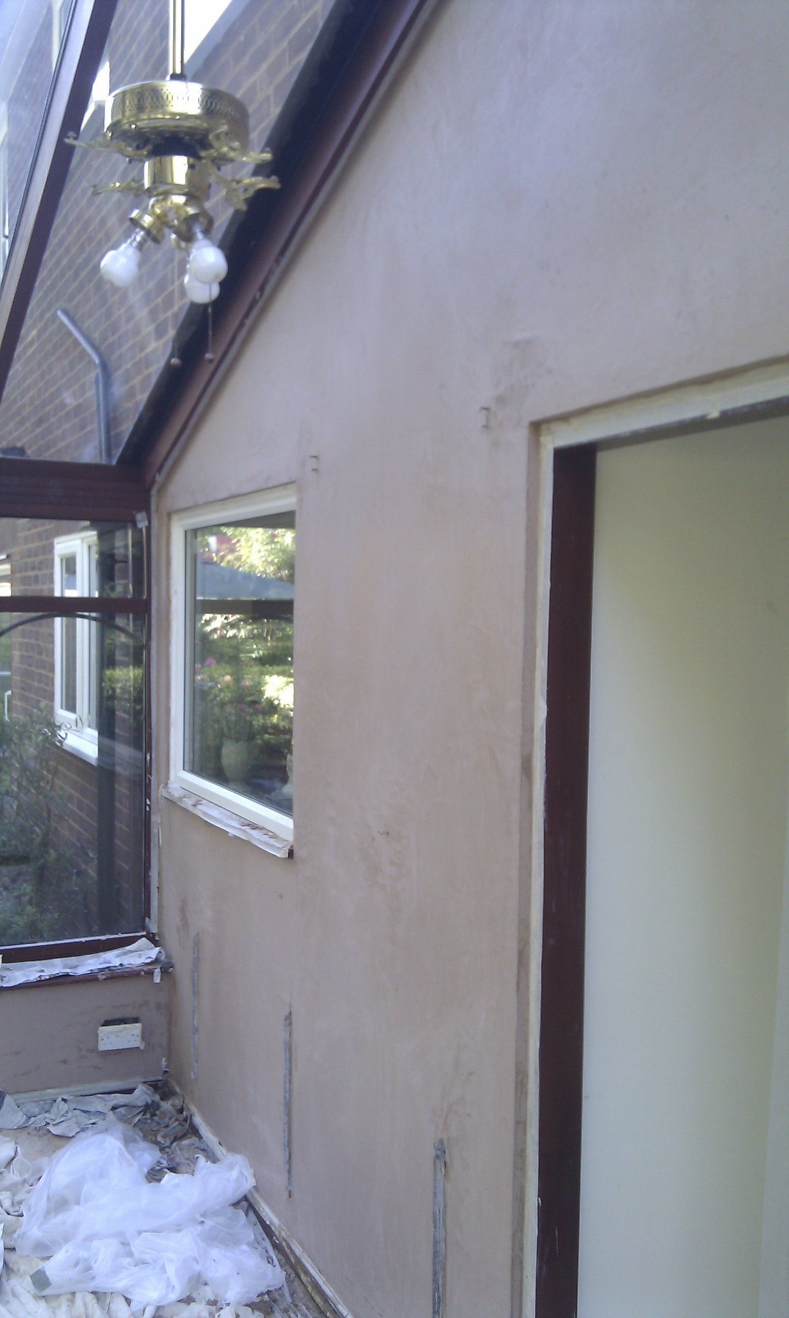 After plastering brick building
