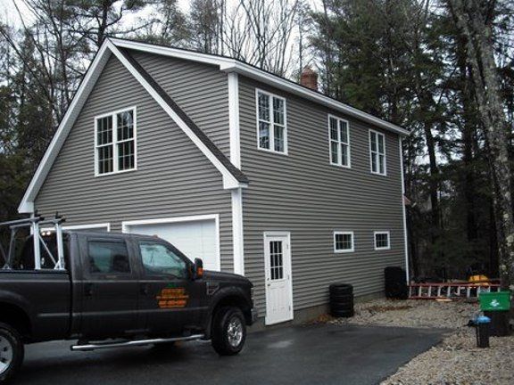 Two-Story Gray Home - Window Services in Eliot, ME