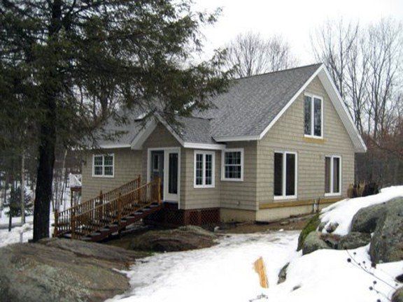 Beautiful Wood Home With Snow Around - Window Services in Eliot, ME
