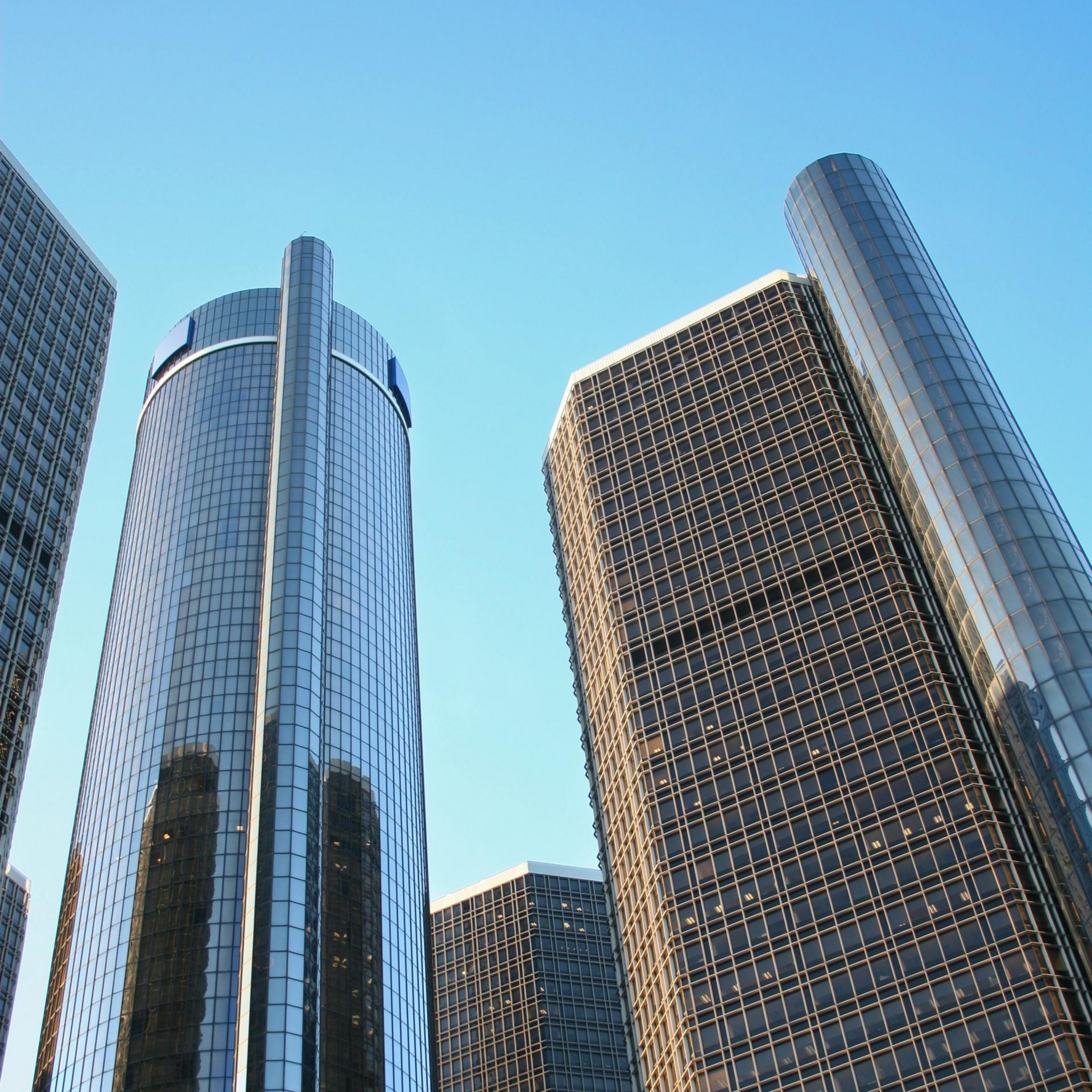 Skyscrapers against a clear blue sky; Detroit's Renaissance Center complex.