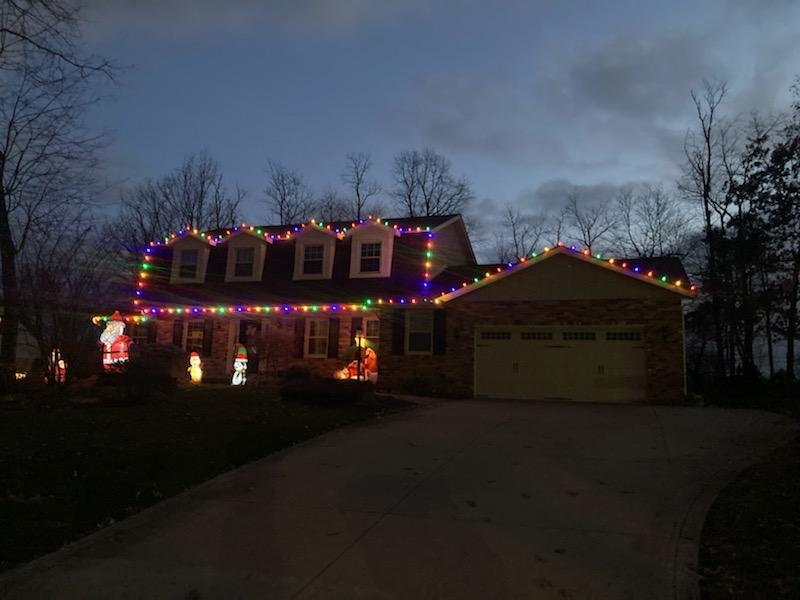 a house is decorated with christmas lights and decorations — Louisville, OH — Mongiardo Power Wash